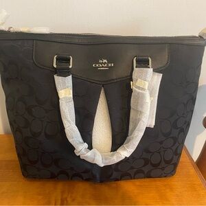 COACH Purse. NWT. Black. Fabric signature pattern.